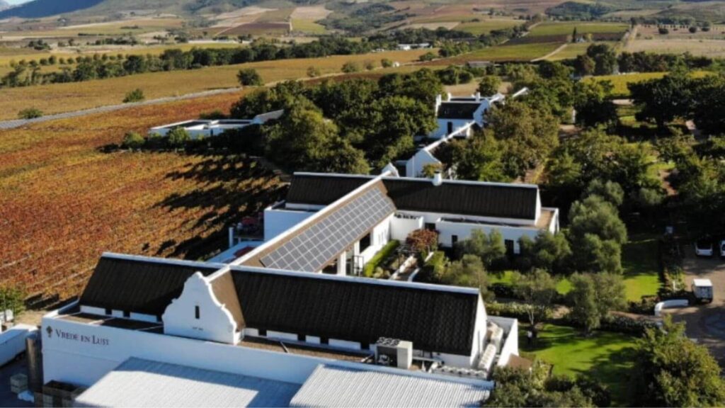 Vrede en Lust Estate in Paarl is a captivating blend of natural beauty and viticultural excellence, where lush vineyards meet historic Cape Dutch architecture, inviting visitors to indulge in superb wines, gourmet cuisine, and panoramic views 
